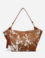 Hyna - Trendy handbag with tassels