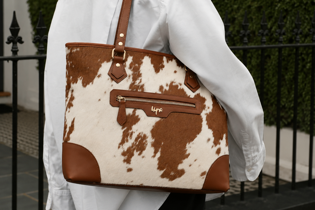 Close-up of genuine natural hair-on cowhide showing real hide texture and pattern